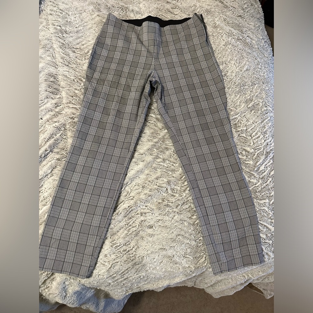 Business bottoms. Falls at the ankle. Slim fit